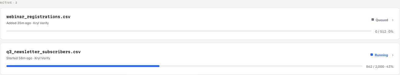 The cleanify jobs list showing a queued job and a running job with a live progress bar and exact row counts